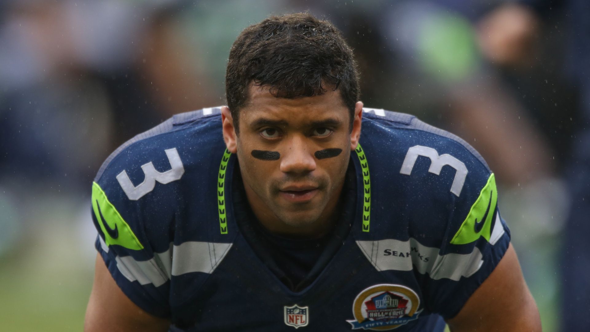 Russell Wilson durante un partido de la NFL con Seattle